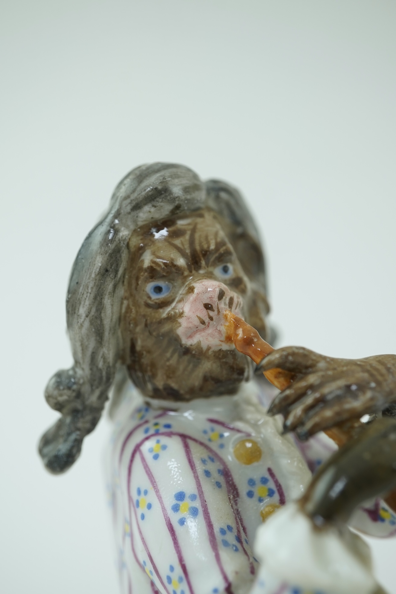 A Meissen monkey band figure of a piccolo player modelled after J. J. Kaendler, 19th century